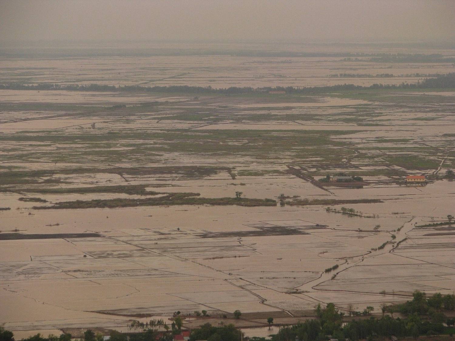 Sunset over a wide branch of the Mekong Delta
